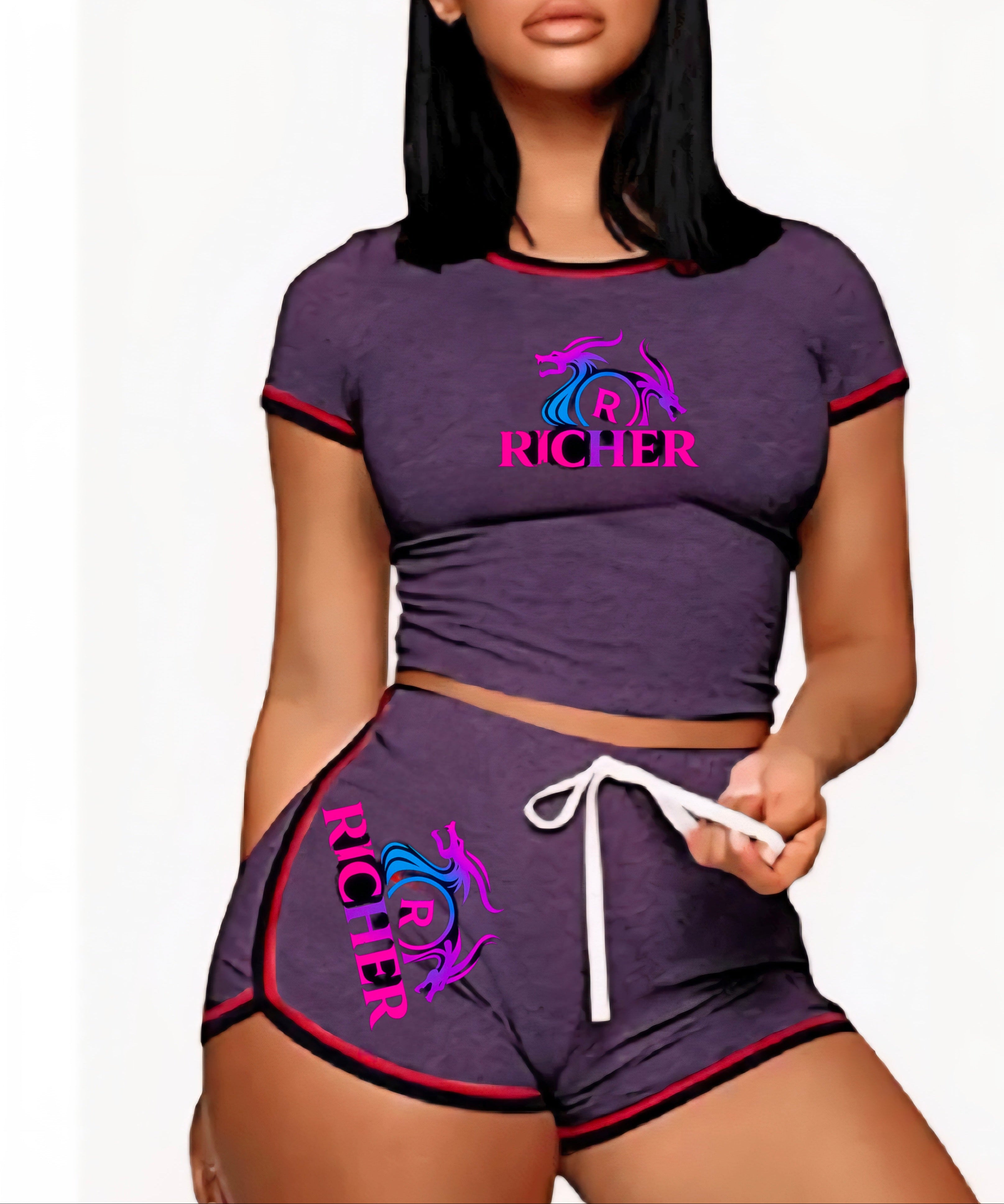 Purple outfit with 'Richer' branding worn by a model on a white background